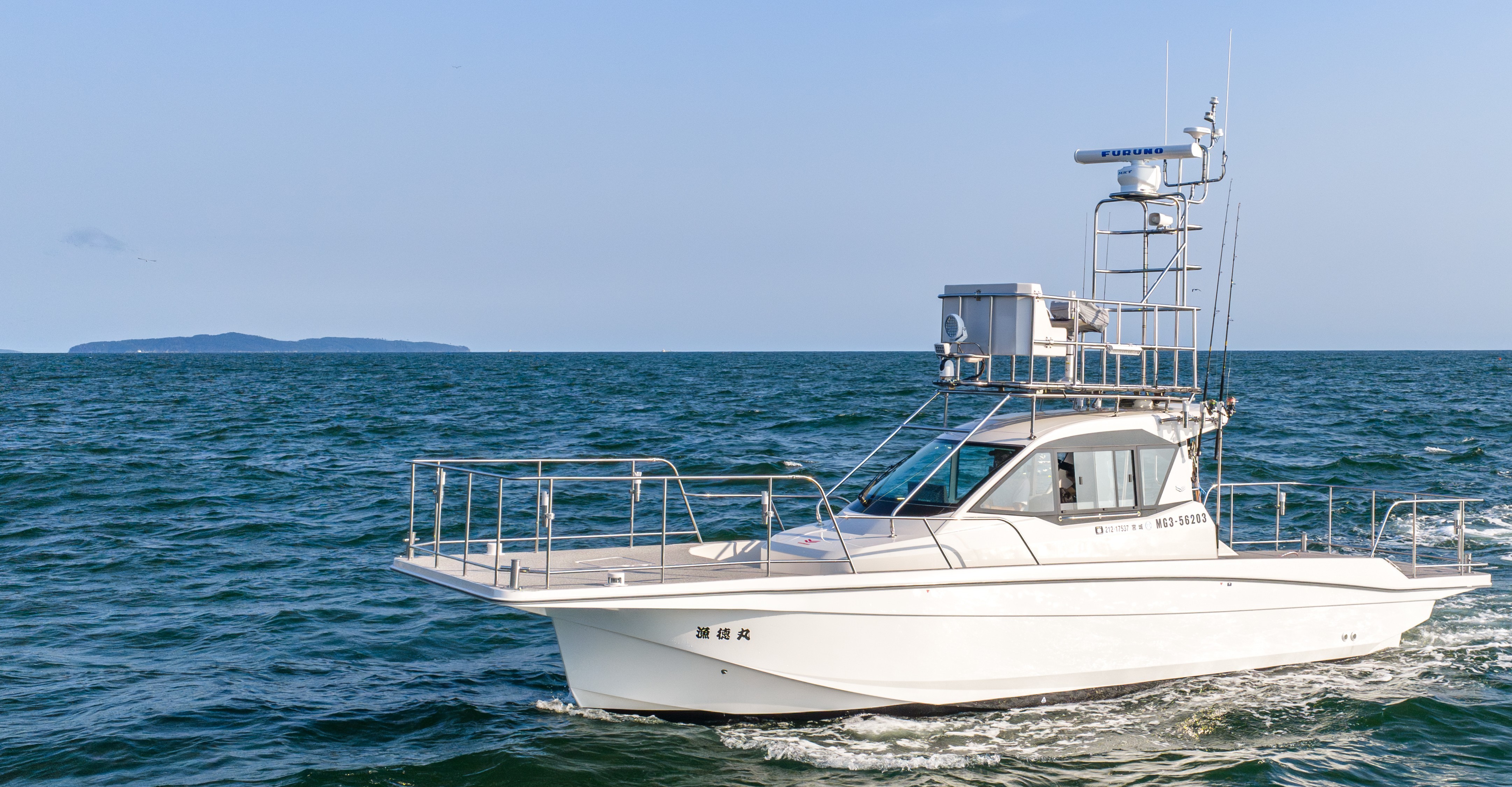 海を航行するYANMAR EX28C 漁徳丸2号艇
